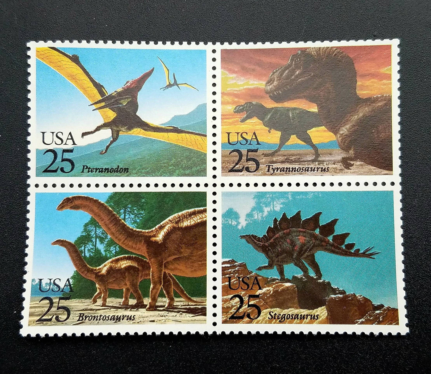 Four (4) vintage postage stamps - Dinosaurs // 25 cent stamps // Face value 1.00 dollar