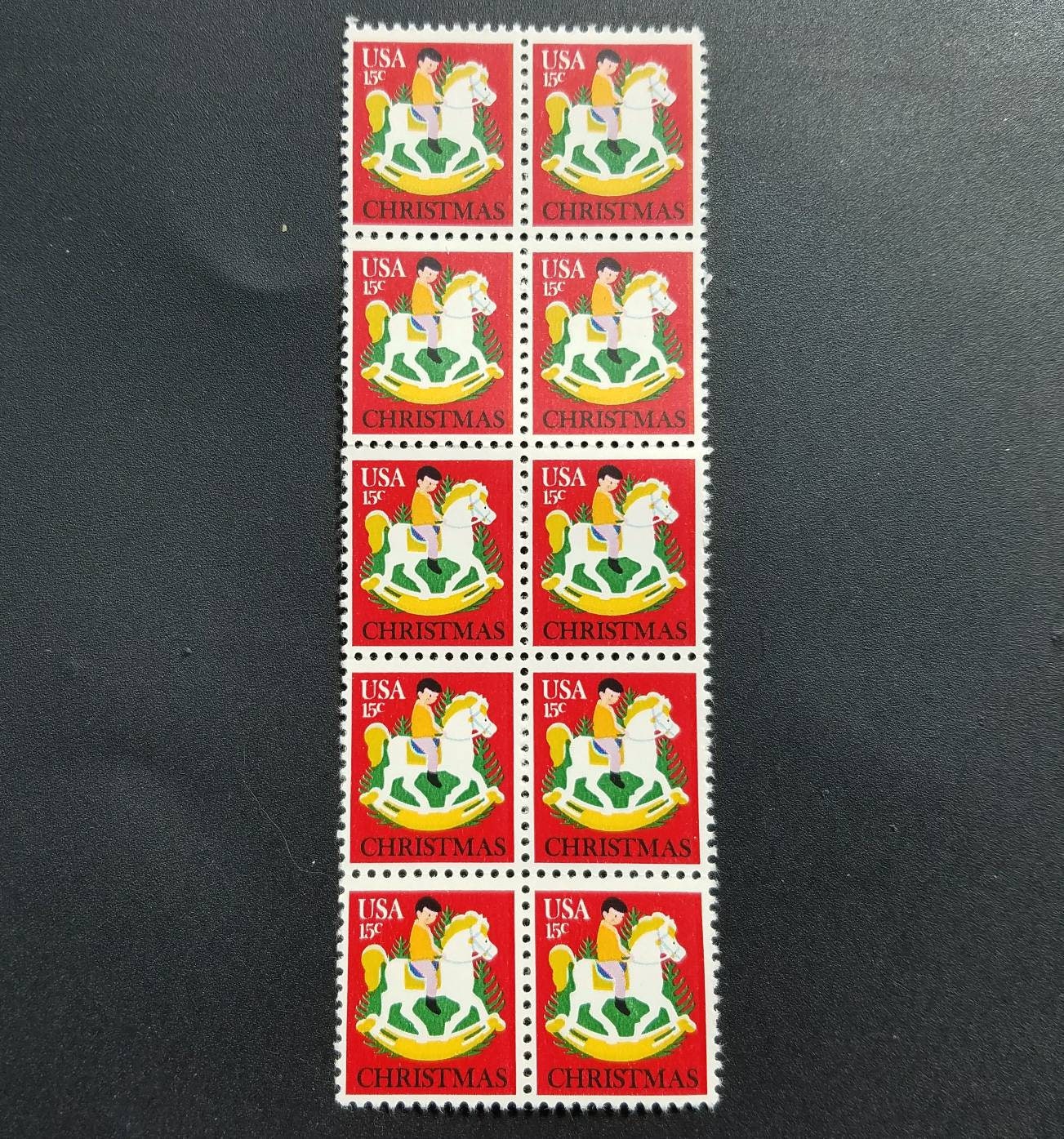 Ten (10) vintage Christmas postage stamps - Child on a rocking horse // 15 cent stamps // Face value 1.50