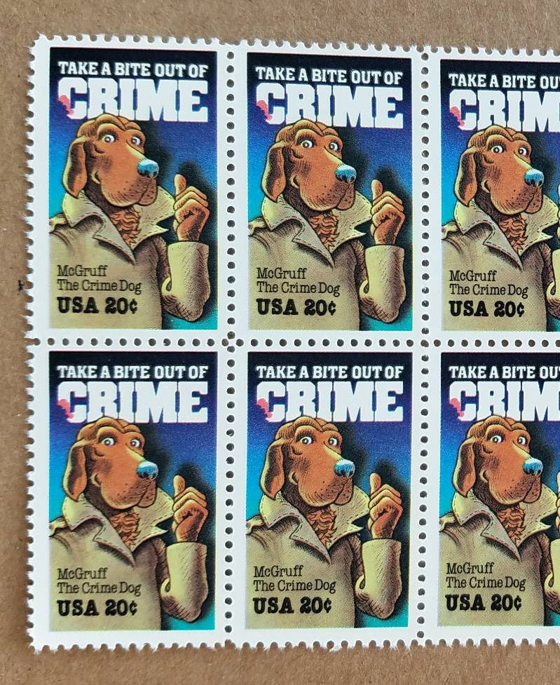 Five (5) vintage unused postage stamps - McGruff the Crime Dog, taking a bite out of crime // 20 cent stamps // Face value 1.00