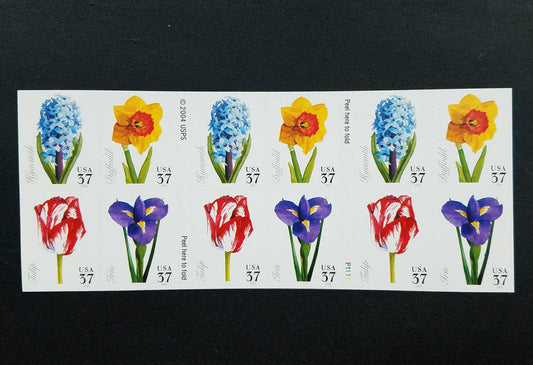 Four (4) unused mint US postage stamps - Spring Flowers (hyacinth, tulip, iris, daffodil) // 37 cent stamps // Face value 1.48