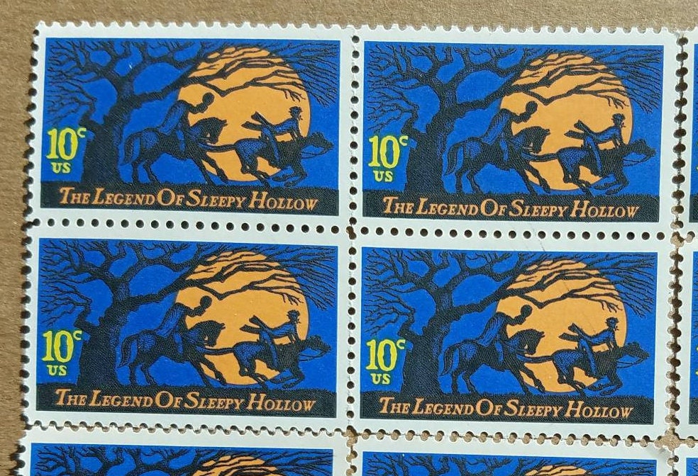 Five (5) vintage unused Halloween postage stamps - Sleepy Hollow, headless horseman // 10 cent stamps // face value 0.50